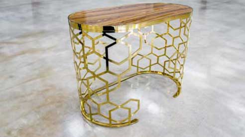 Gold hexagonal side table with timber top