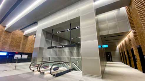 Crows Nest Train Station — brushed stainless steel platform cladding